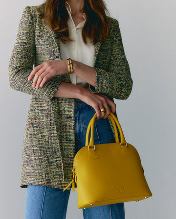 Bolso de mujer amarillo mostaza estilo bugatti de piel fabricado en Ubrique, España Leandra a la venta en leandrabrand.com fabricado en Ubrique, España